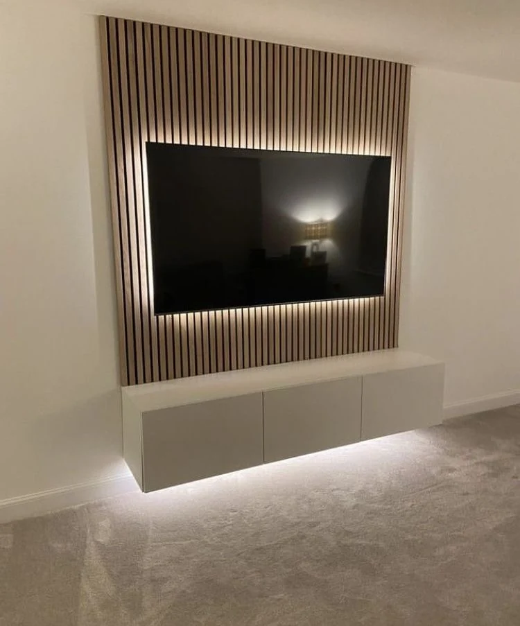Floating storage unit beneath a wall-mounted TV